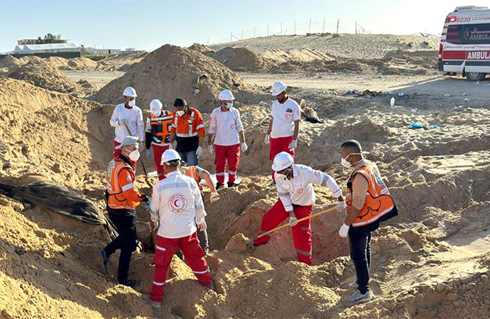 Inside massacre of Gaza aid workers found dead and buried with hands bound