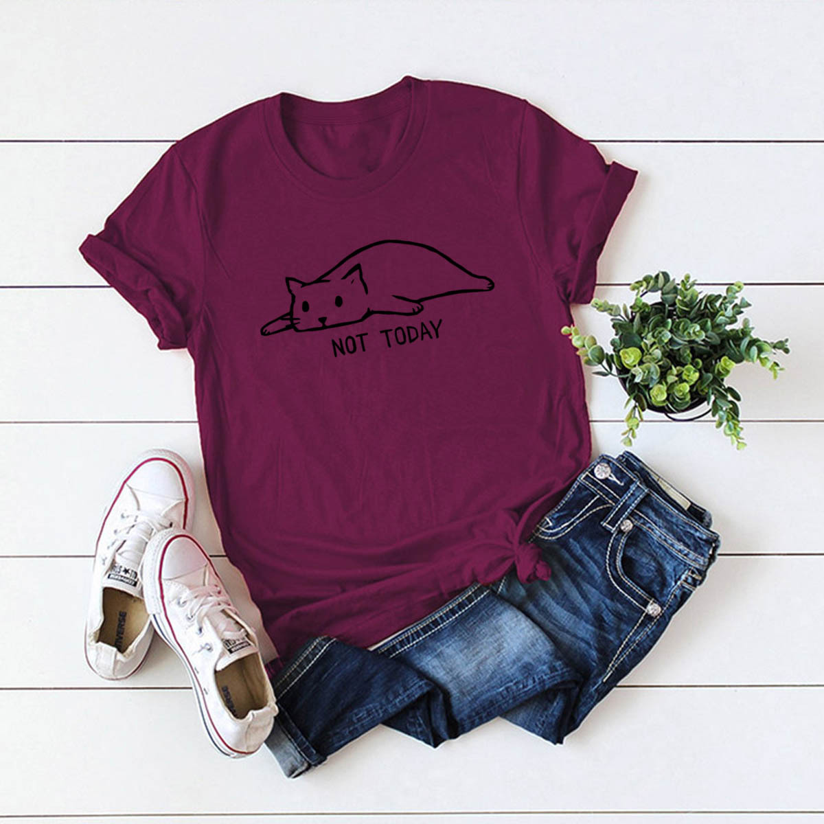  The best designs of the year for a women's T-shirt of pure cotton with short sleeves on it, a graphic clipping accompanied by letters and phrases