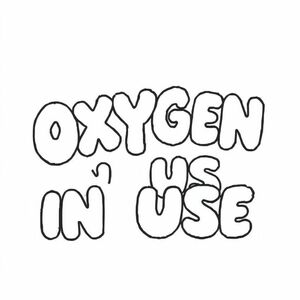 White background with the words OXYGEN IN USE in bubble letters centered on the page.  The words take up most of the paper and it reads in a landscape direction.