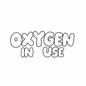 On a blank page the words "OXYGEN IN USE" written in bubble letters, landscape orientation, centered on the page, and takes up most of the page