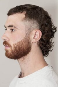 Tight Fade With Mullet Haircut For Men