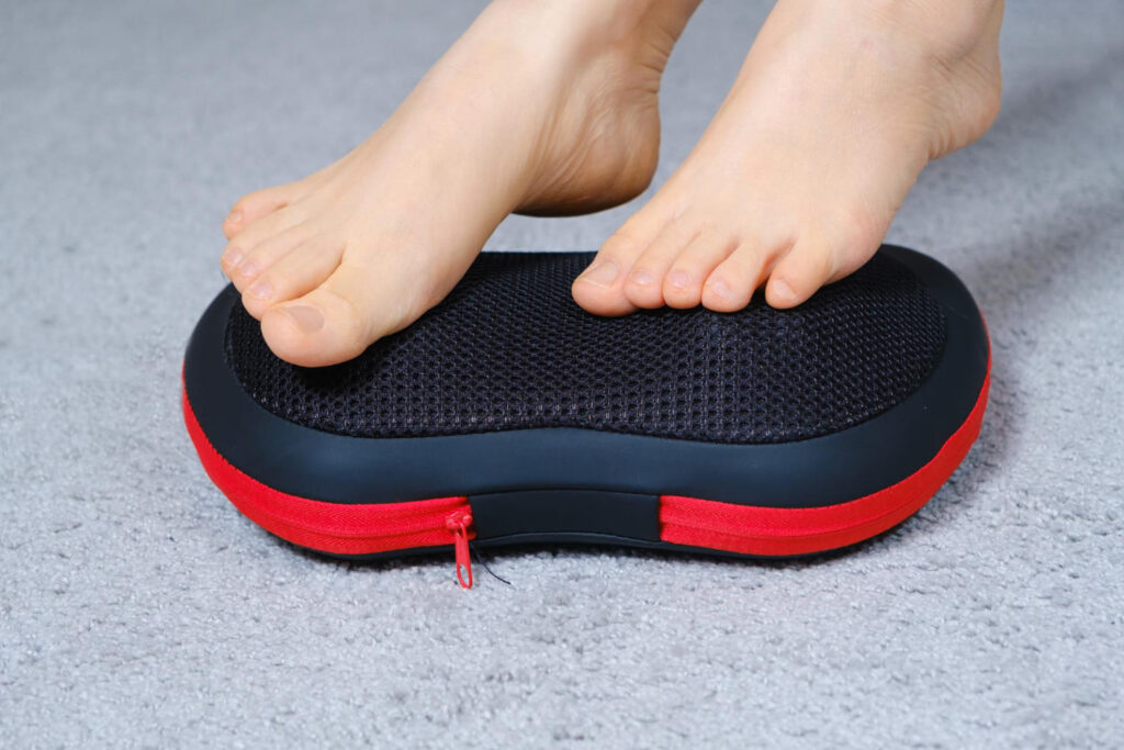 A woman's feet on the best foot massager