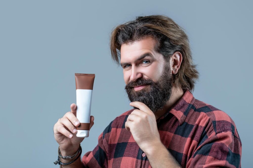 A man holding the best beard relaxer