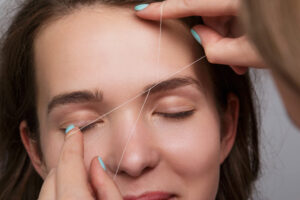 Eyebrow correction with white thread