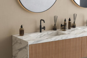 A modern bathroom vanity with marble material