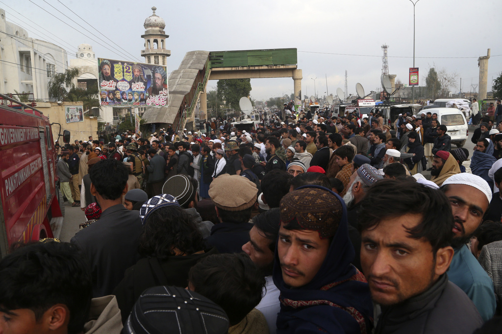 Thousands attend funeral for senior Taliban-linked cleric slain in Pakistan