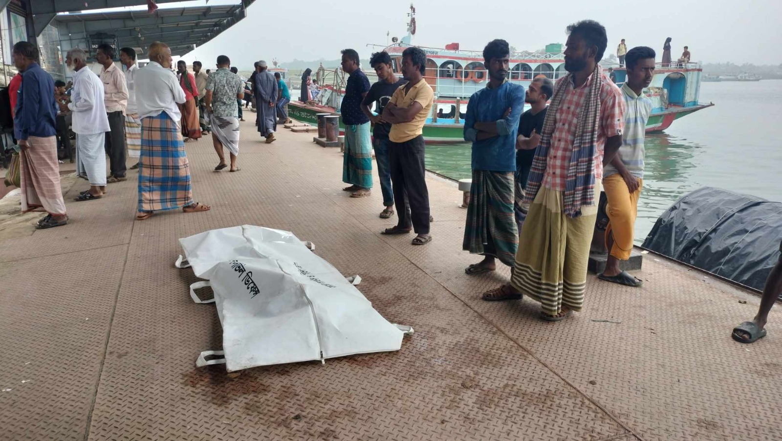 Transport worker dies falling in Padma River