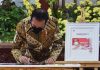 Indonesian president launches COVID-19 vaccination serial stamp
