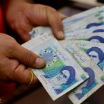 Mata uang Iran jatuh