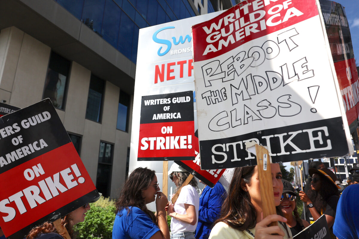 LOS ANGELES, CALIFORNIA - SEPTEMBER 22: Striking WGA (Writers Guild of America) members picket with striking SAG-AFTRA members outside Netflix studios on September 22, 2023 in Los Angeles, California. The Writers Guild of America and Alliance of Motion Picture and Television Producers (AMPTP) are reportedly meeting for a third straight day today in a new round of contract talks in the nearly five-months long writers strike. 