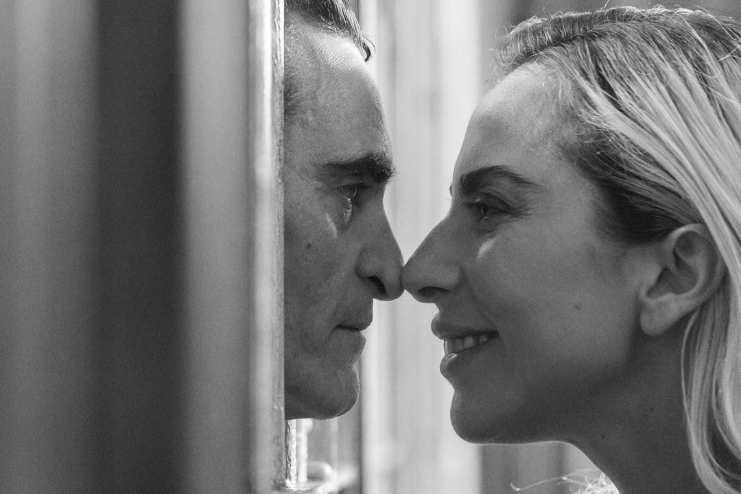 Lady Gaga and Joaquin Phoenix in new black and white still photo from Joker 2