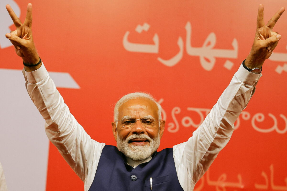 Indian Prime Minister Narendra Modi gestures, at the Bharatiya Janata Party (BJP) headquarters in New Delhi