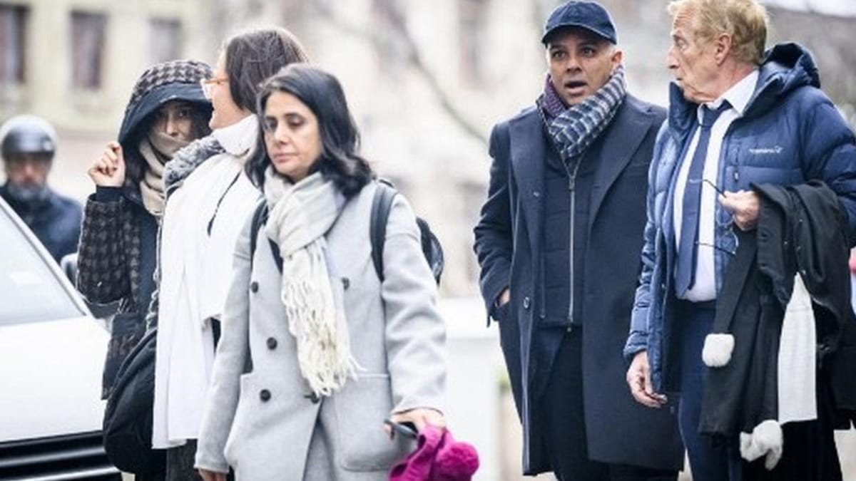 Indian-Swiss billionaire family members Namrata Hinduja (left) and Ajay Hinduja (second right) arrive at a Geneva courthouse with their lawyers Yael Hayat (centre) and Robert Assael (right) at the opening day of their trial for human trafficking on January 15, 2024. | Photo Credit: AFP