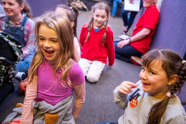 Children laughing inside Life Education mobile classroom