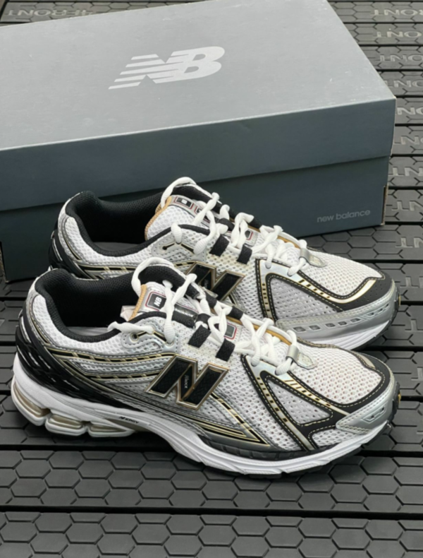 G114Z New Balance M1906R $57 gallery