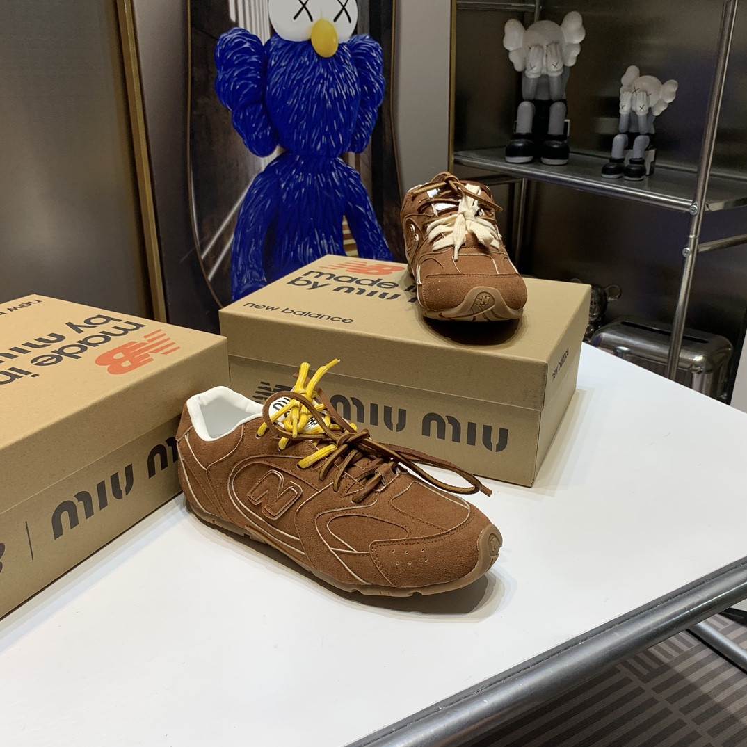 G180Z Miu Miu x New Balance $54 gallery