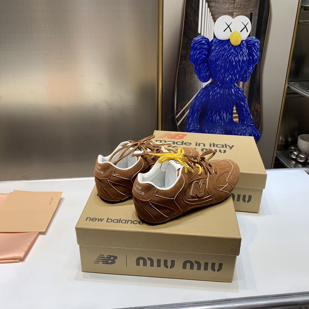 G180Z Miu Miu x New Balance $54 gallery