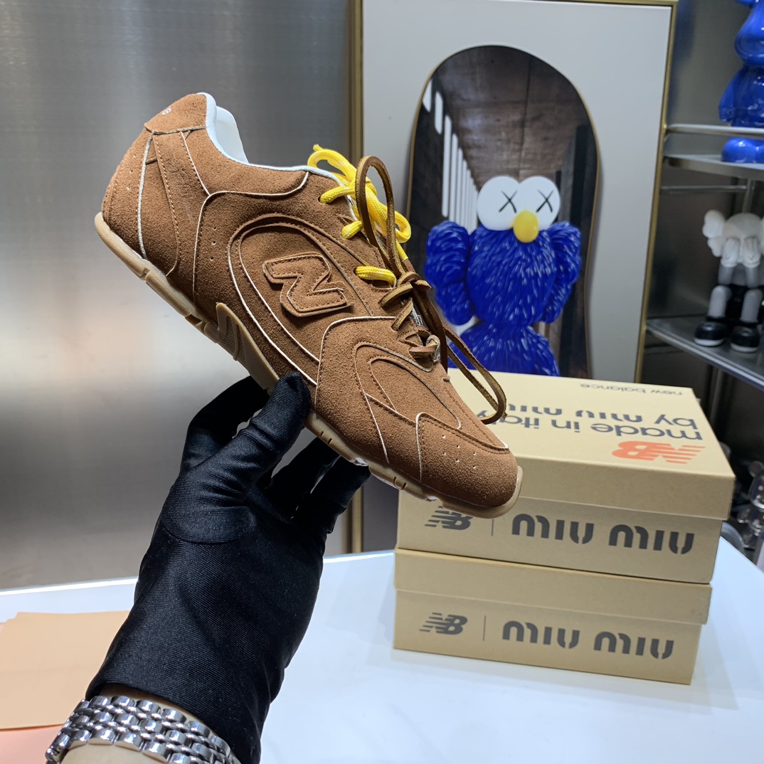 G180Z Miu Miu x New Balance $54 gallery
