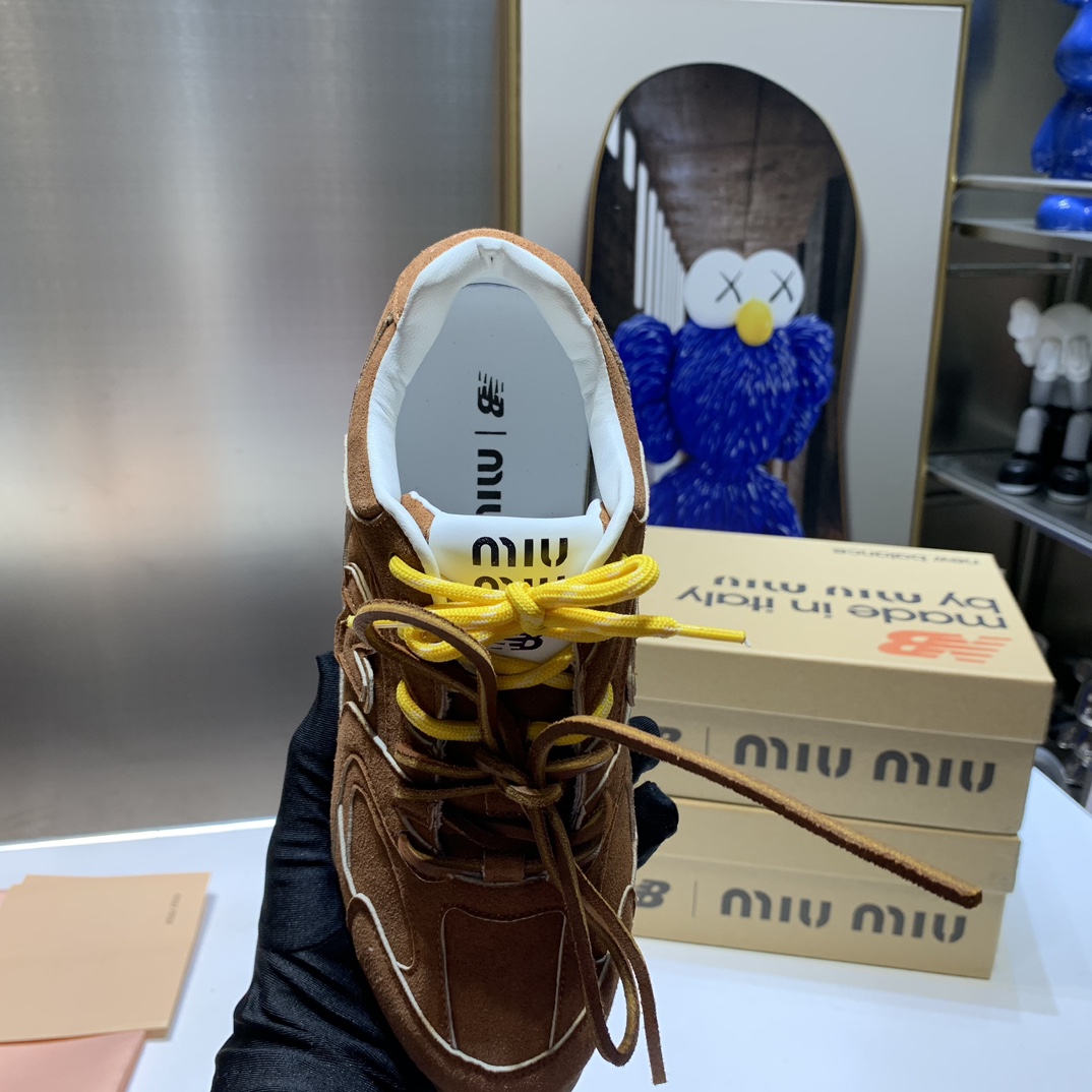 G180Z Miu Miu x New Balance $54 gallery