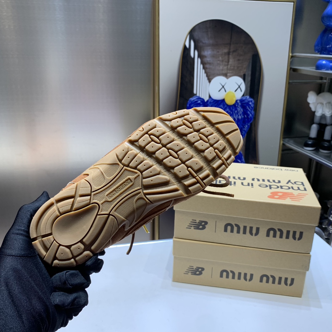 G180Z Miu Miu x New Balance $54 gallery