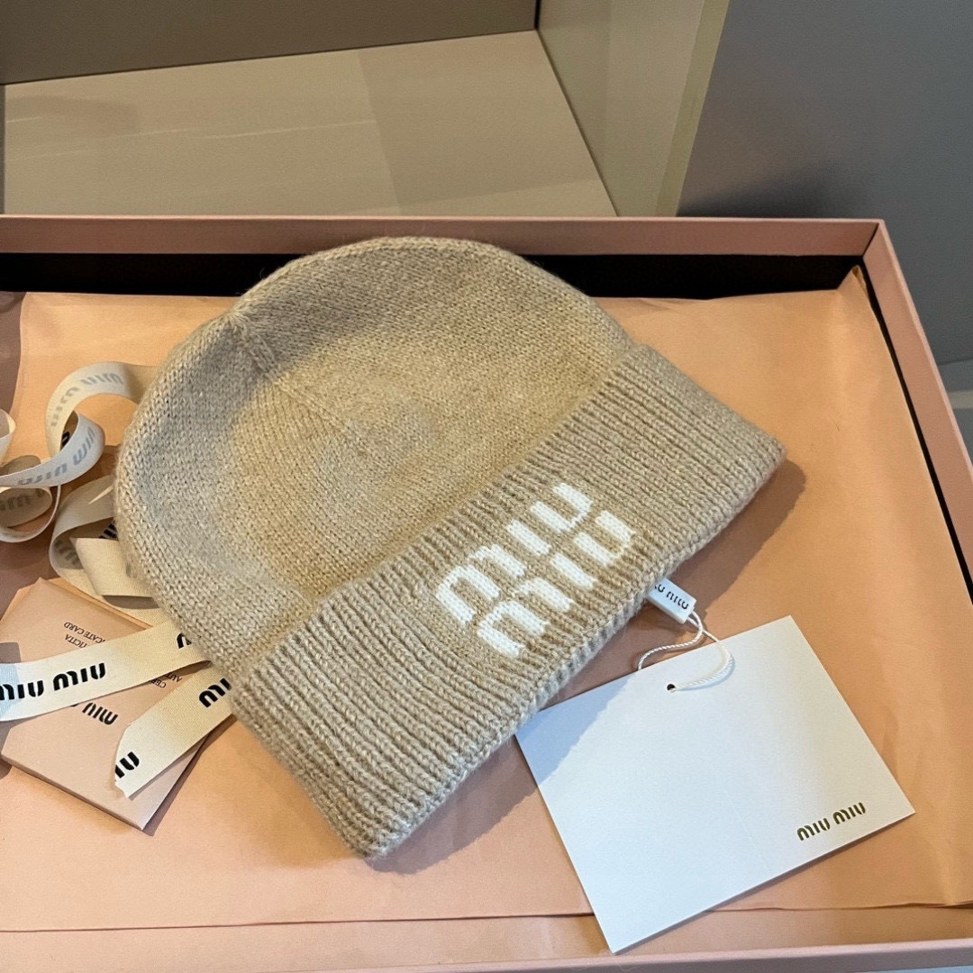 ZH361 MIUMIU knitted hat 25$ gallery