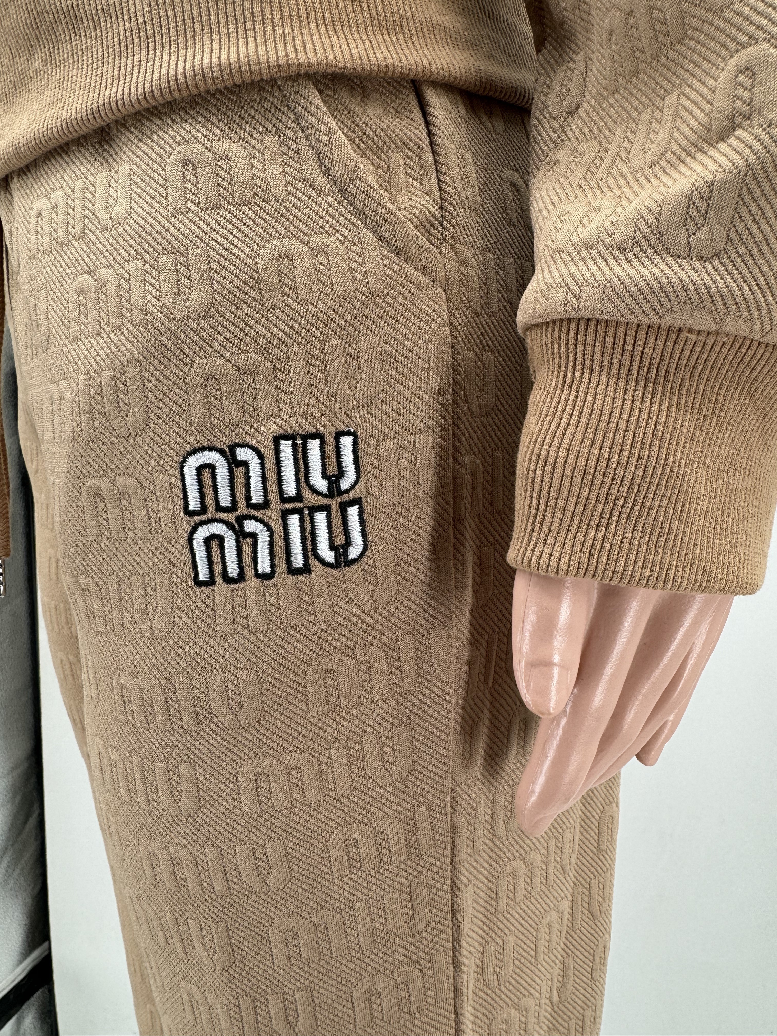 $35.43 MIUMIU ZT9383 gallery