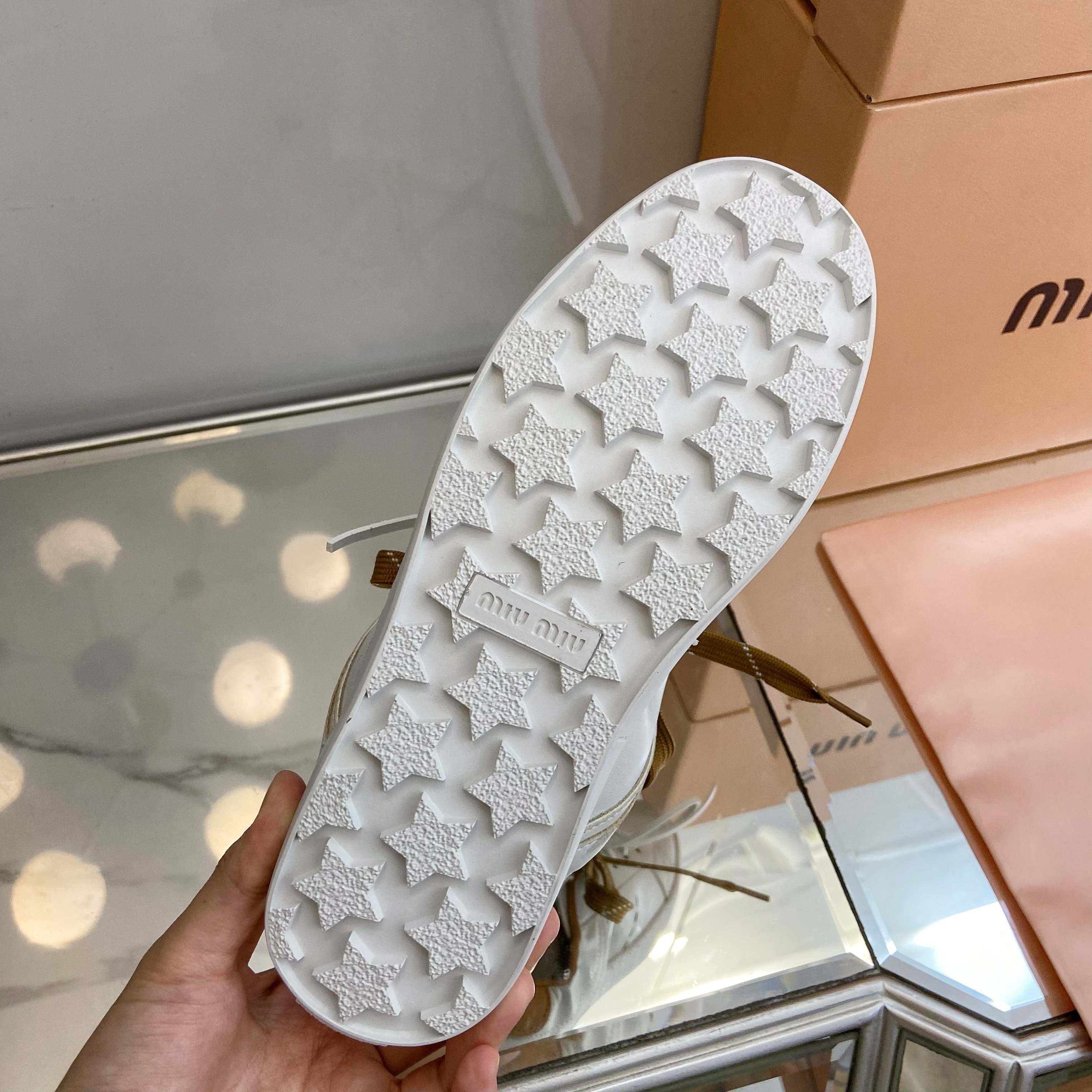 $44.64 MIUMIU ZT9875 gallery