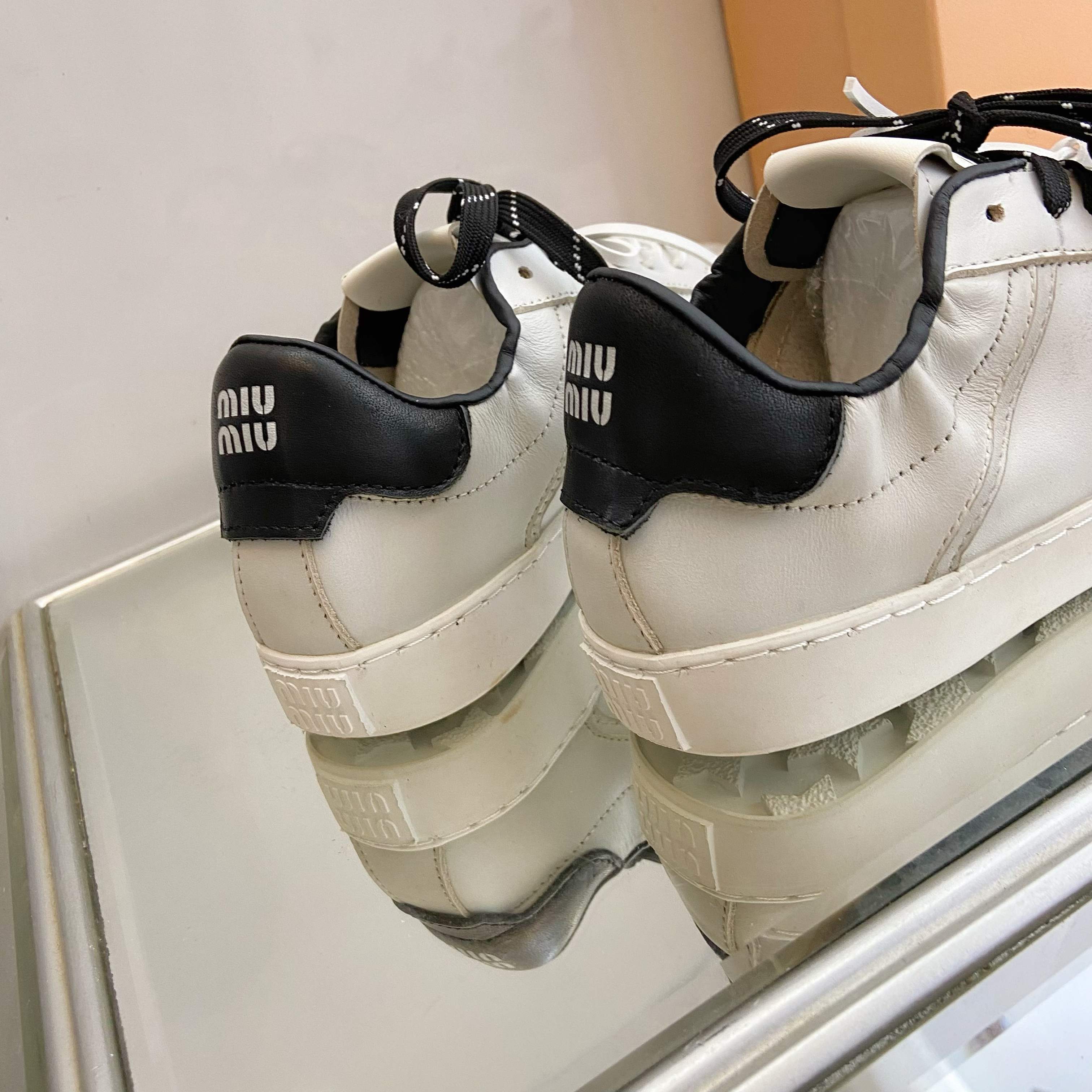 $44.64 MIUMIU ZT9875 gallery