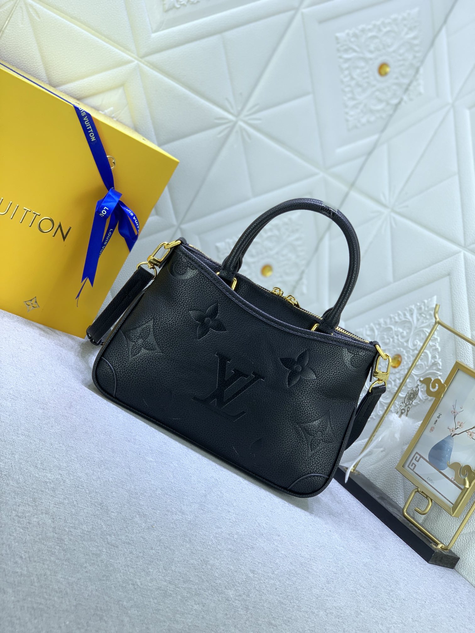 LV $70 gallery