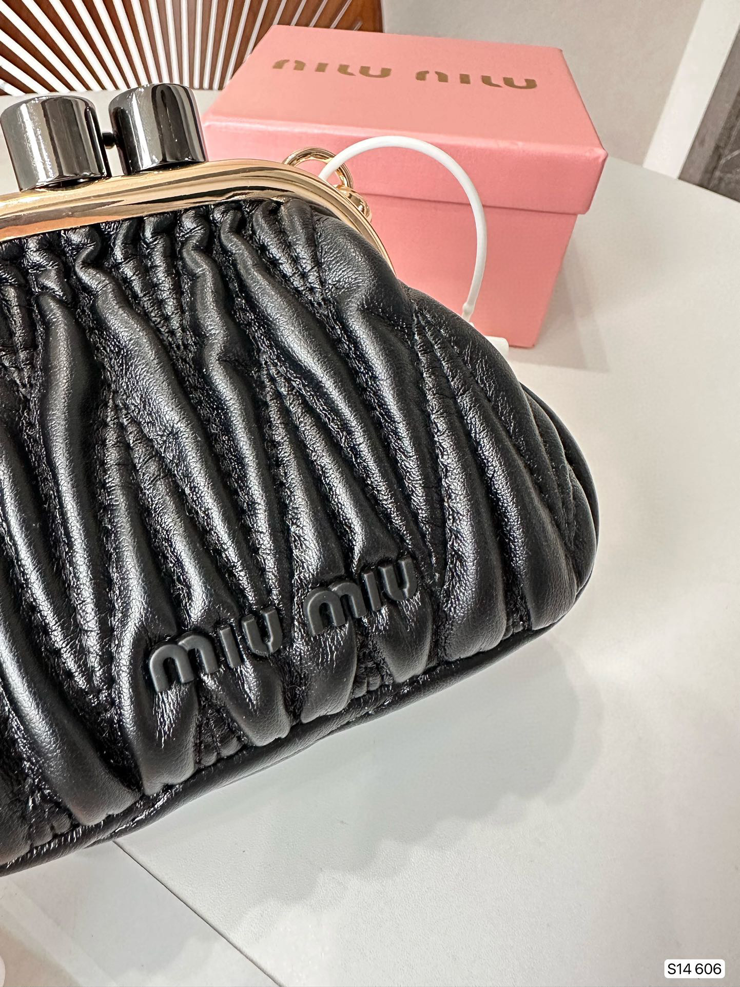 1236 $56 miumiu gallery