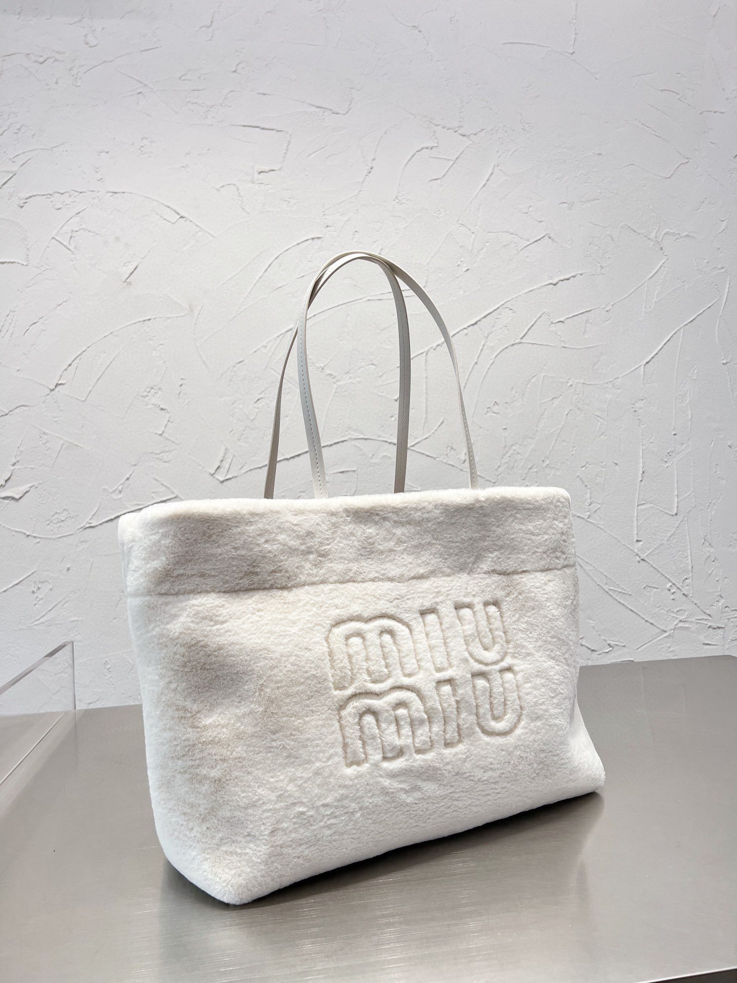 1238 $56 miumiu gallery