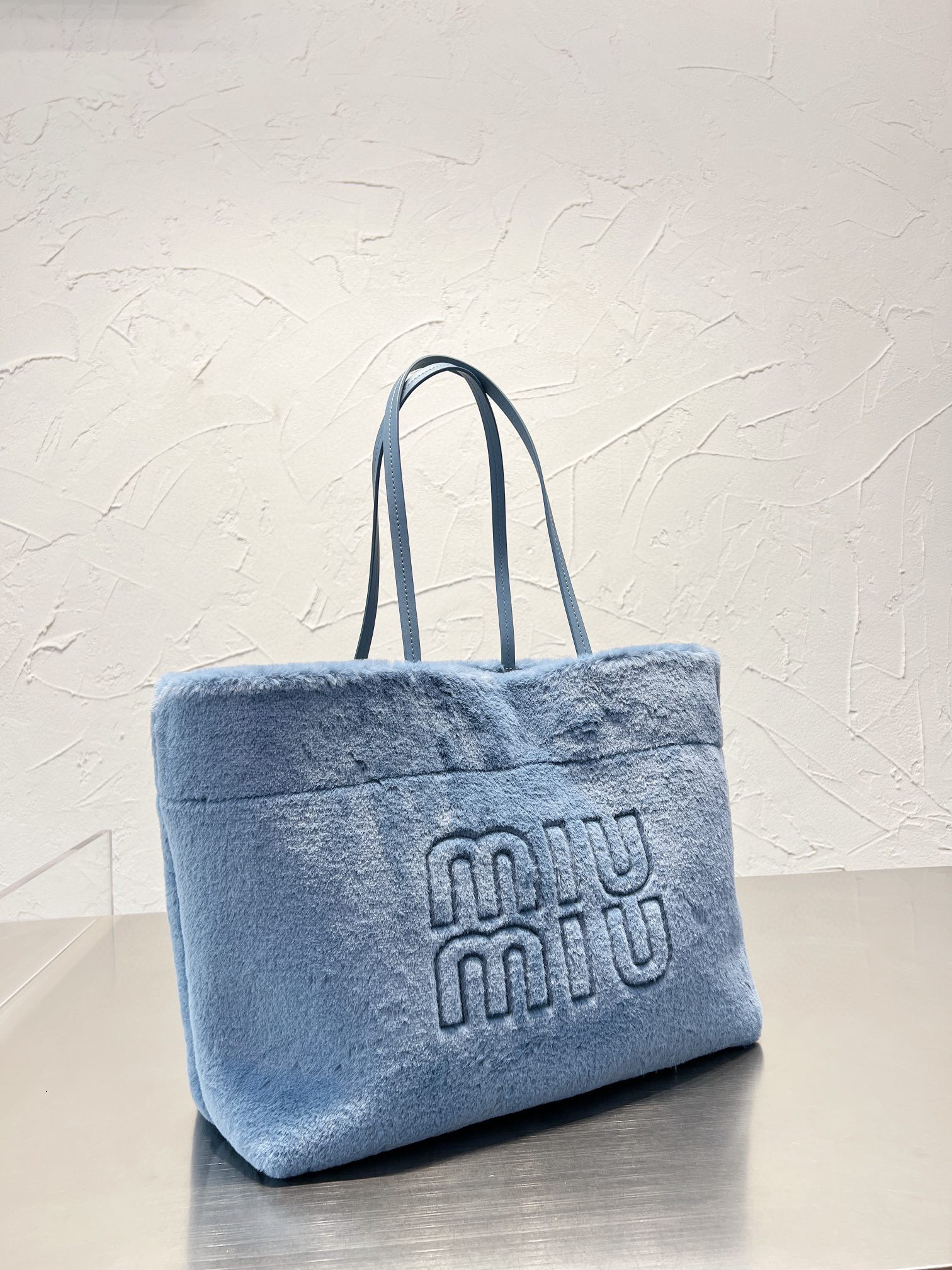 1238 $56 miumiu gallery