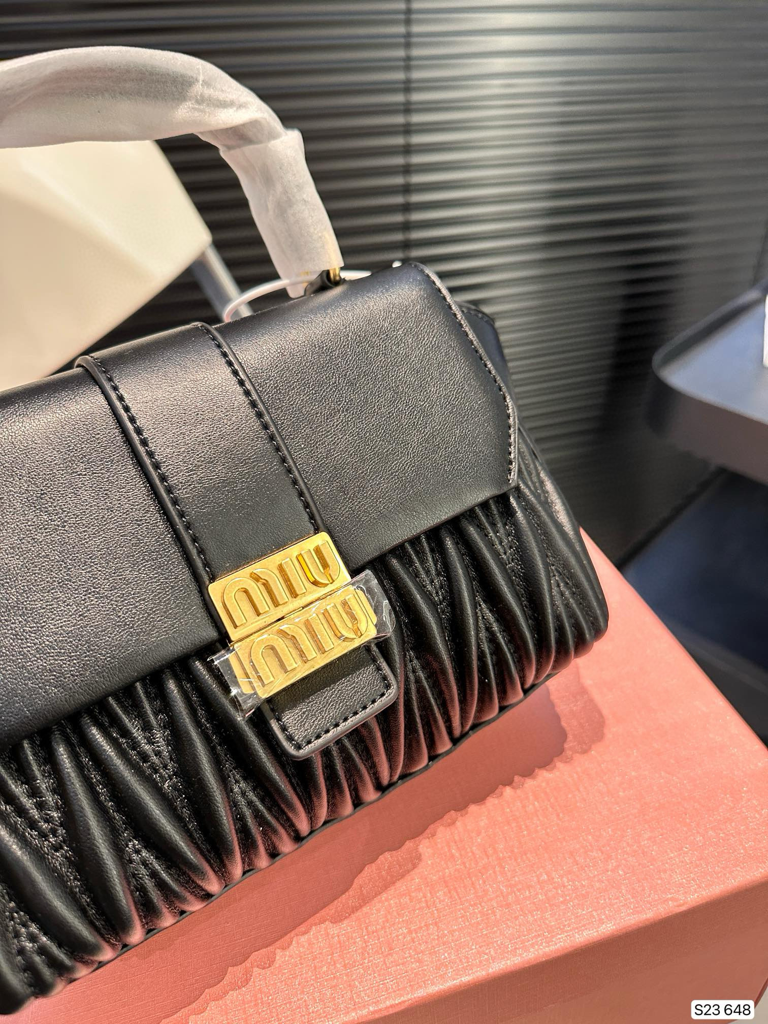 1253 $75 miumiu gallery