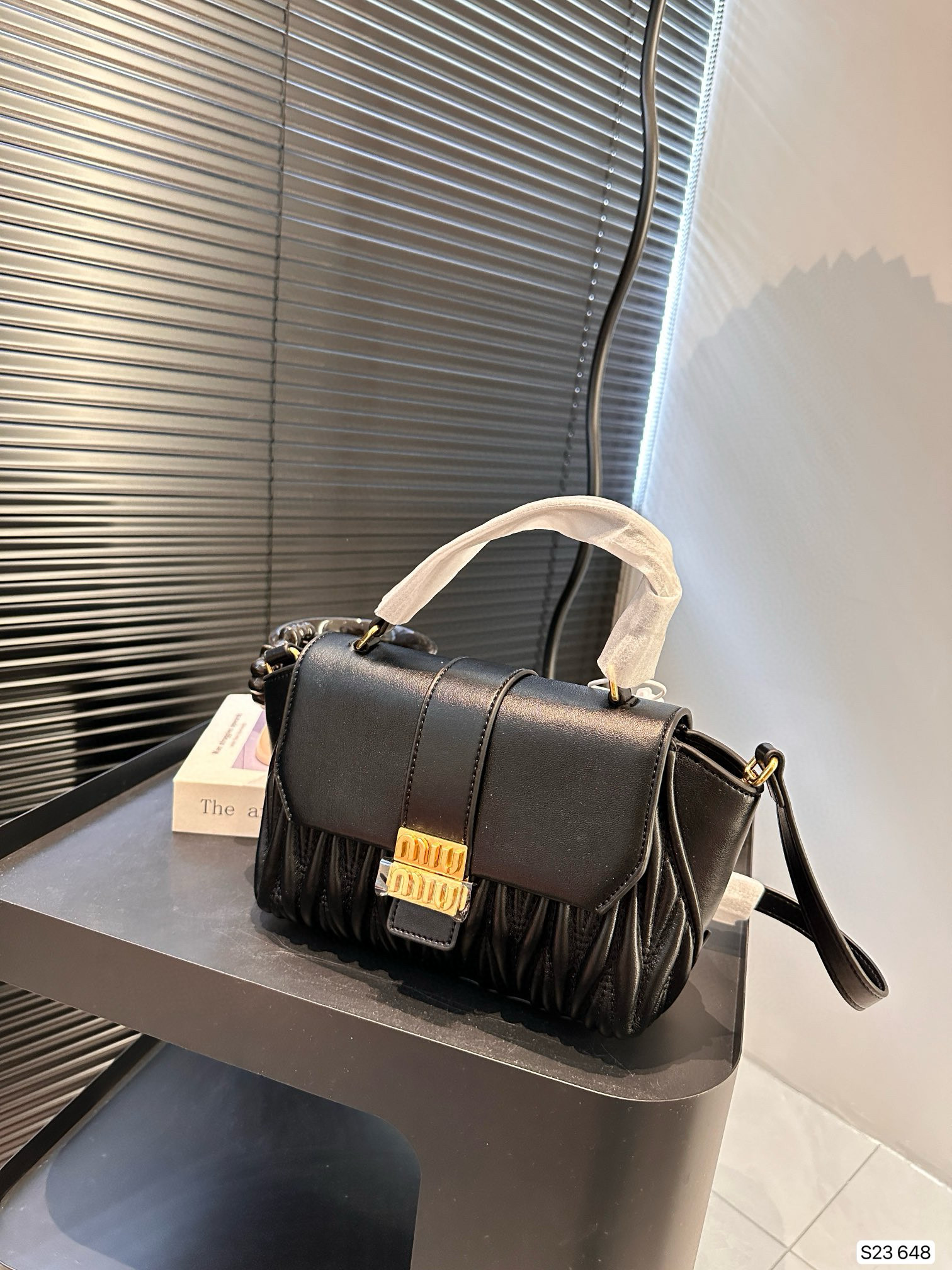1253 $75 miumiu gallery