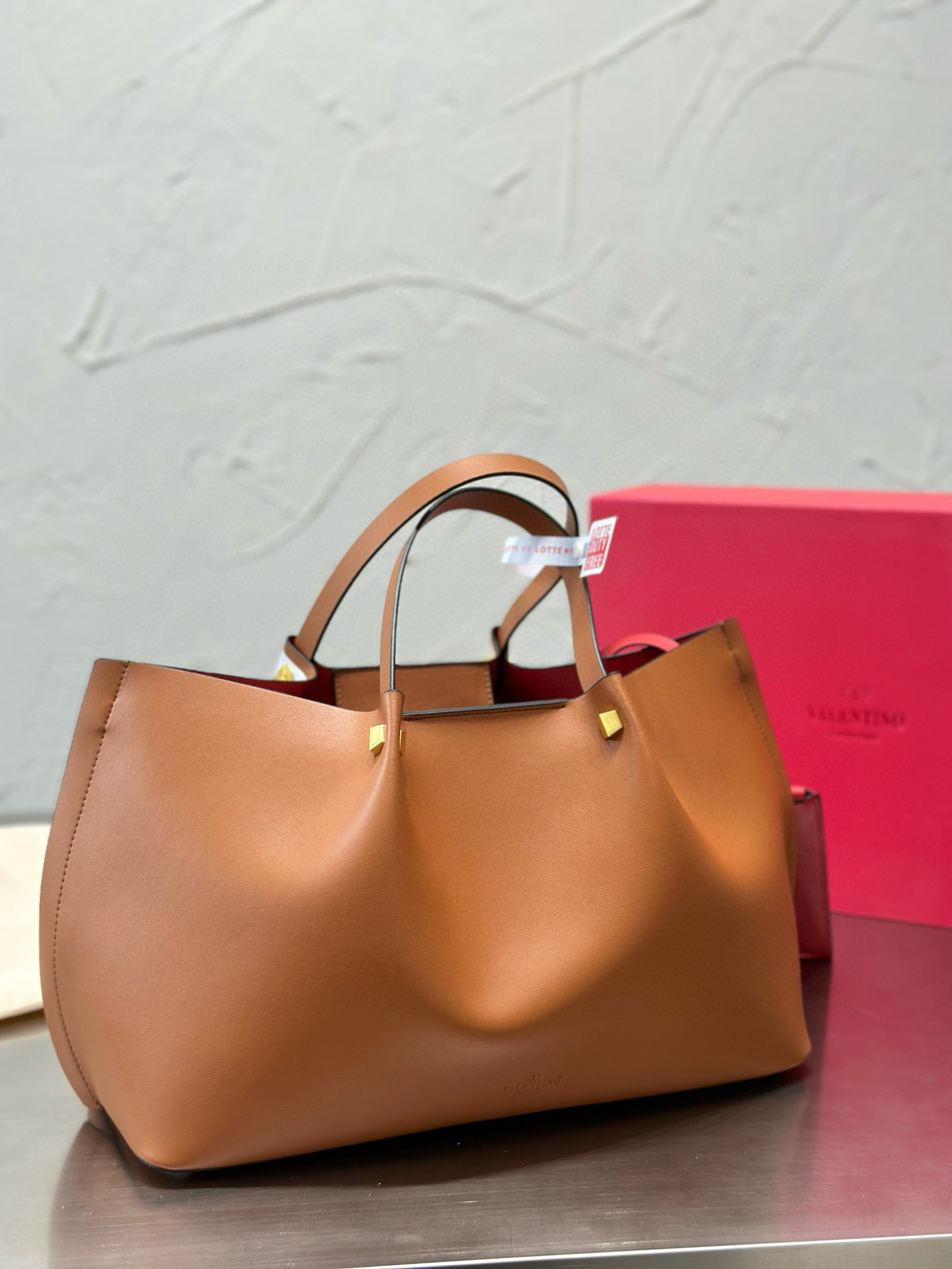 257 $65 Valentino gallery