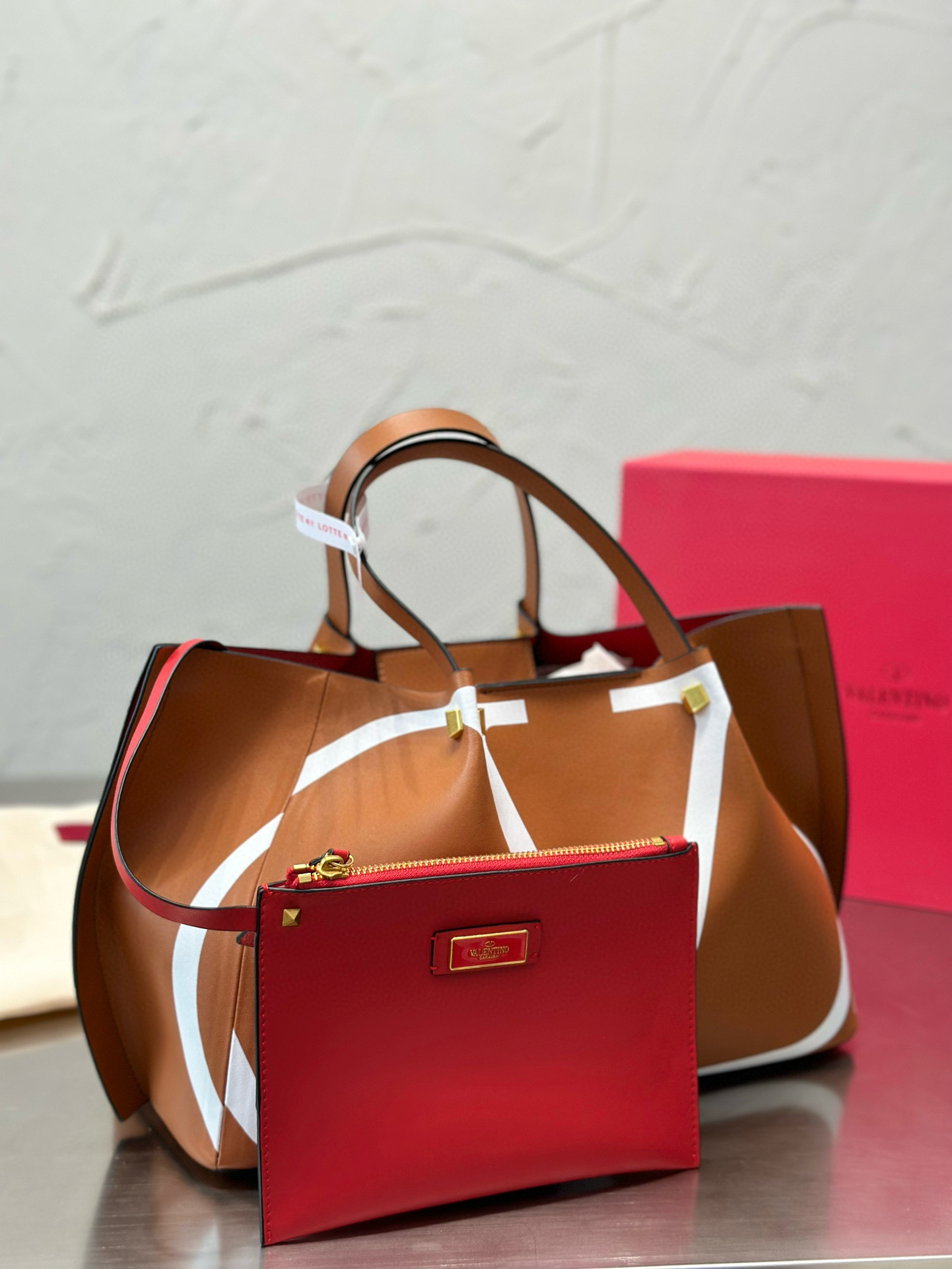 257 $65 Valentino gallery