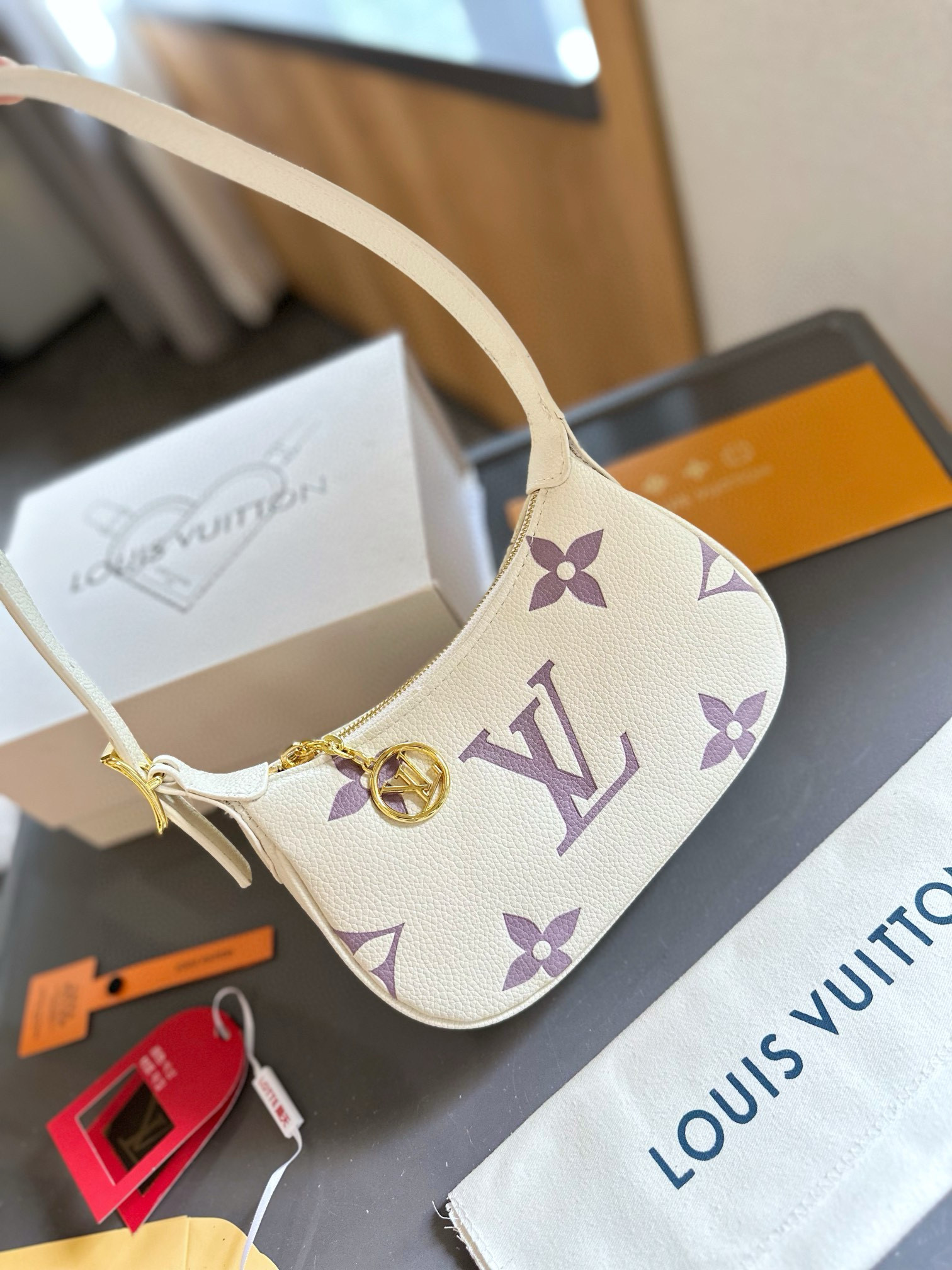 695 $77 LV gallery
