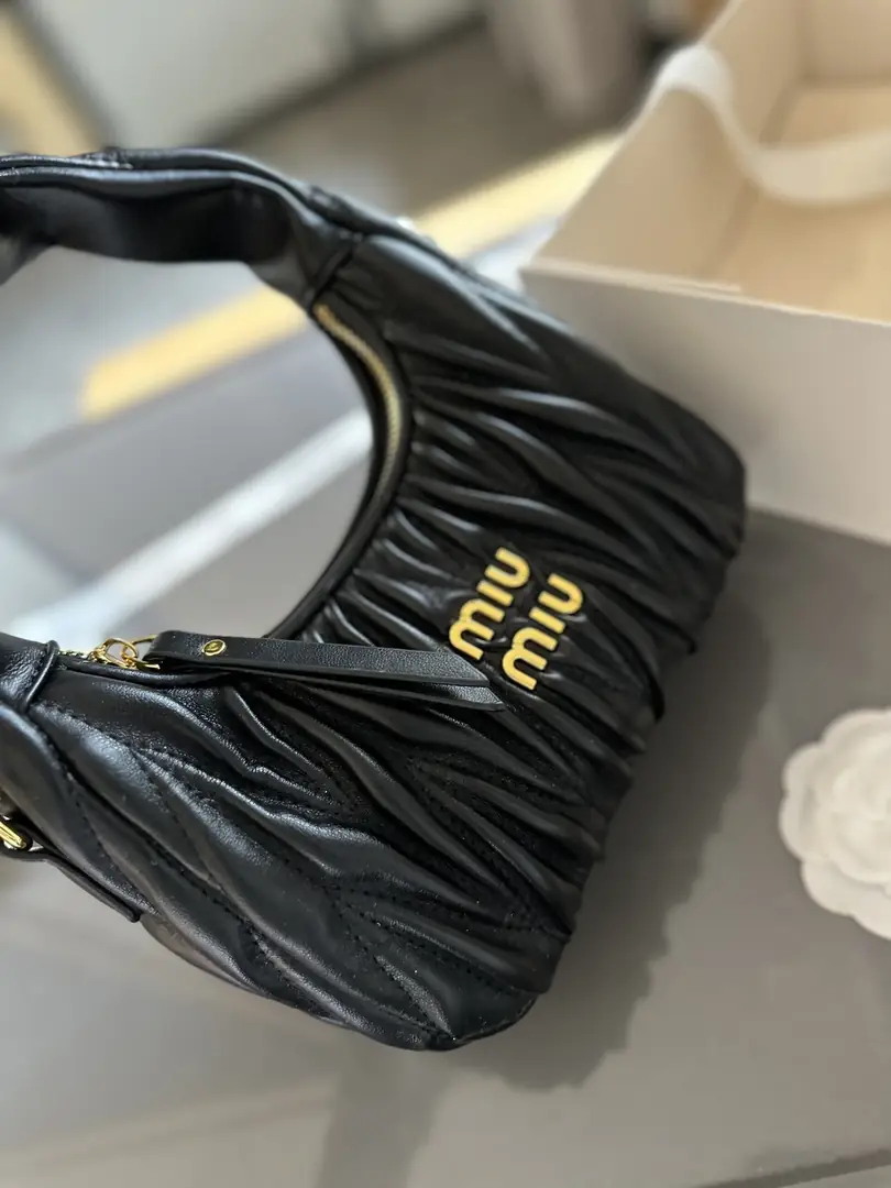 4883-53.88$-miumiu gallery