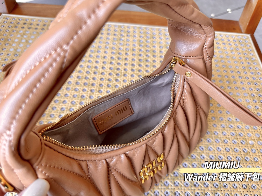 TL5588 MIUMIU  55$ gallery
