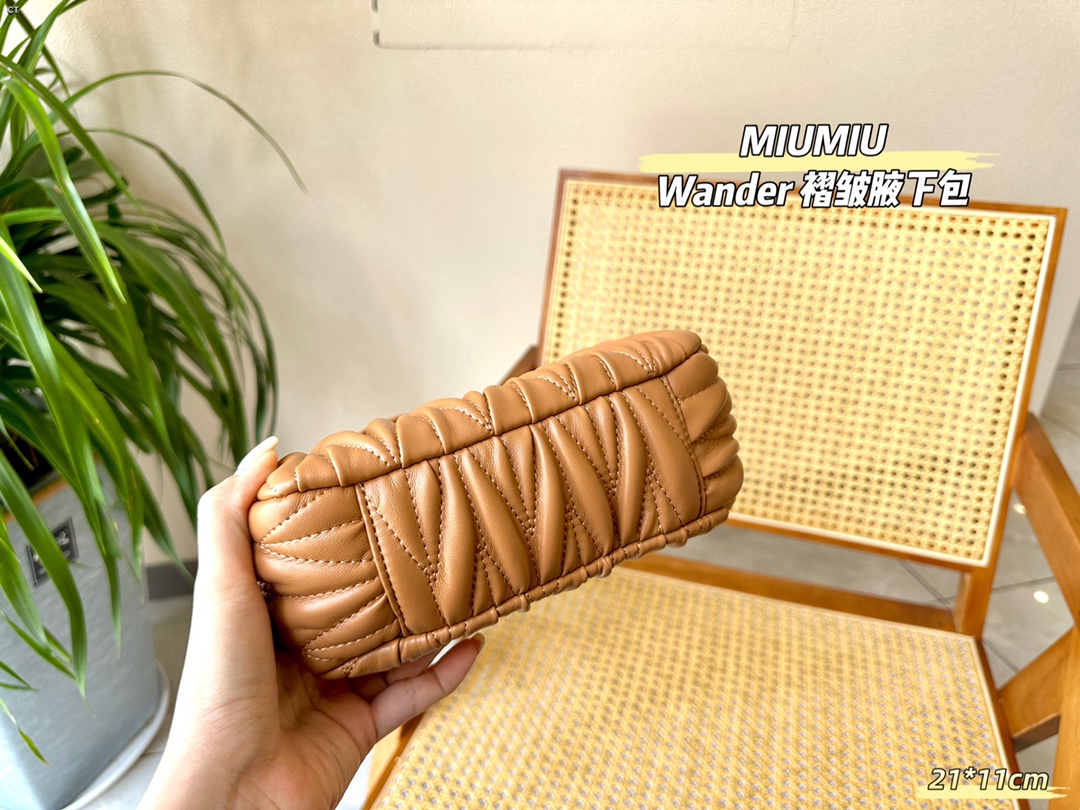 TL5588 MIUMIU  55$ gallery