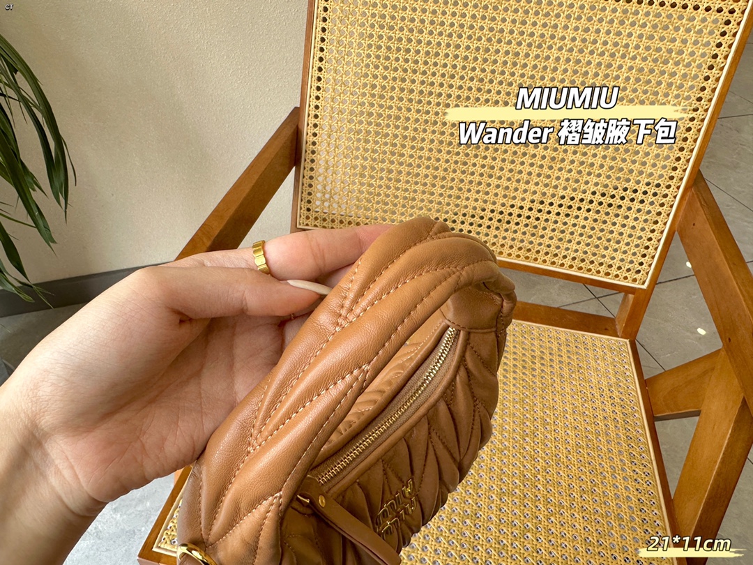 TL5588 MIUMIU  55$ gallery