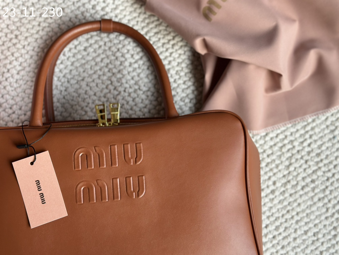 TL6434 MIUMIU  68$ gallery