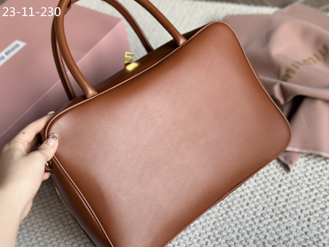 TL6434 MIUMIU  68$ gallery