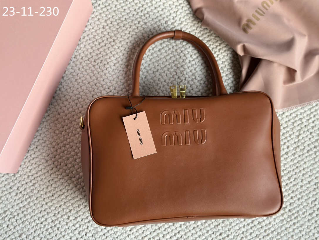 TL6434 MIUMIU  68$ gallery