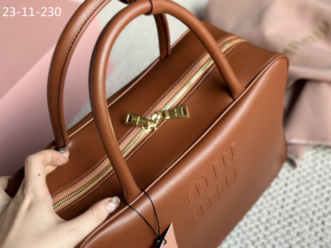 TL6434 MIUMIU  68$ gallery