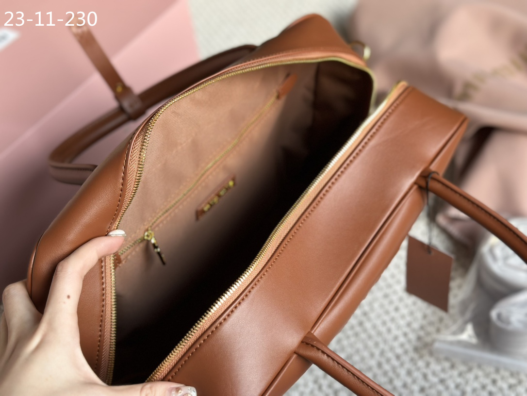 TL6434 MIUMIU  68$ gallery