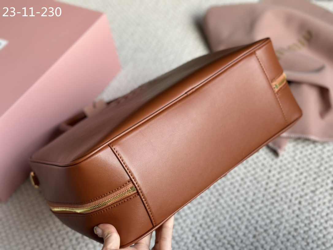 TL6434 MIUMIU  68$ gallery