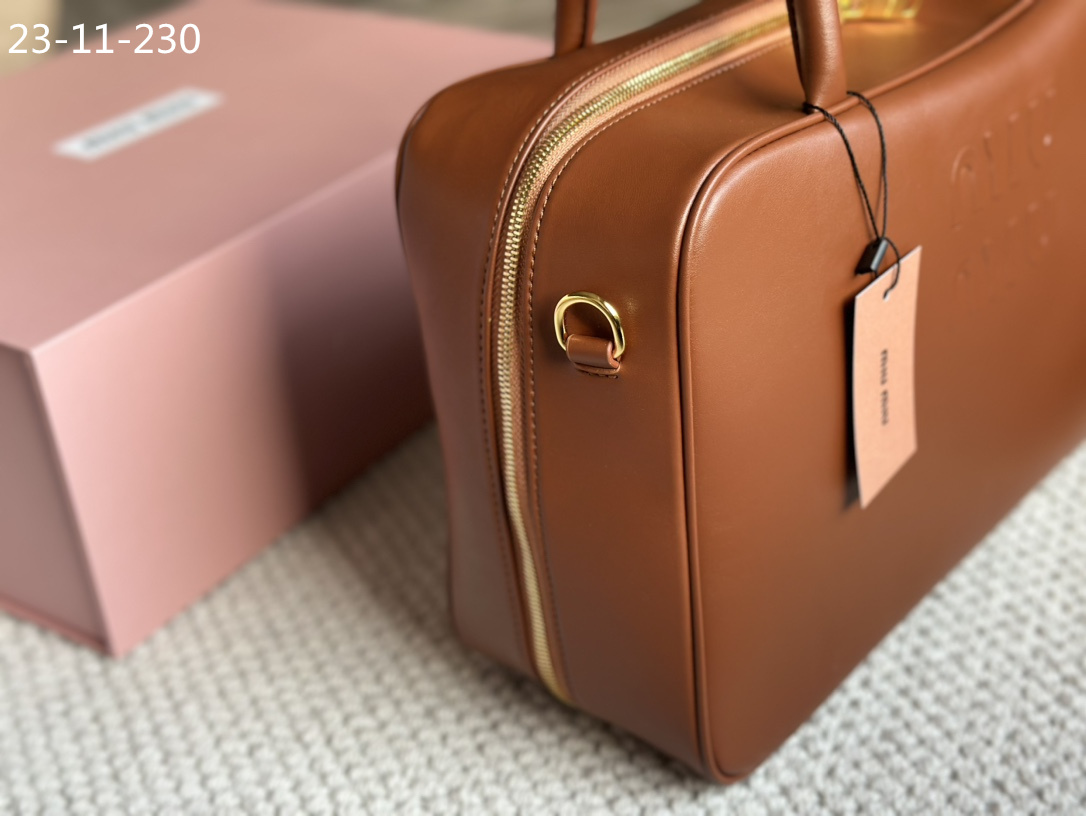 TL6434 MIUMIU  68$ gallery