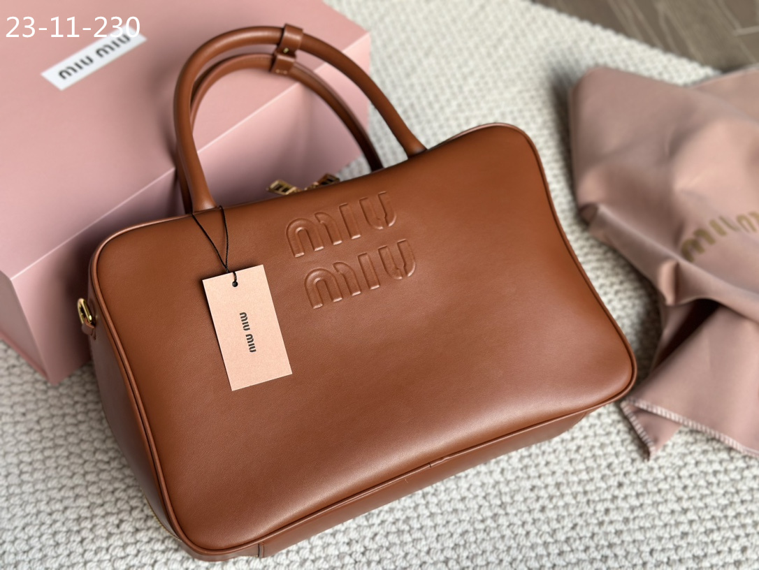 TL6434 MIUMIU  68$ gallery