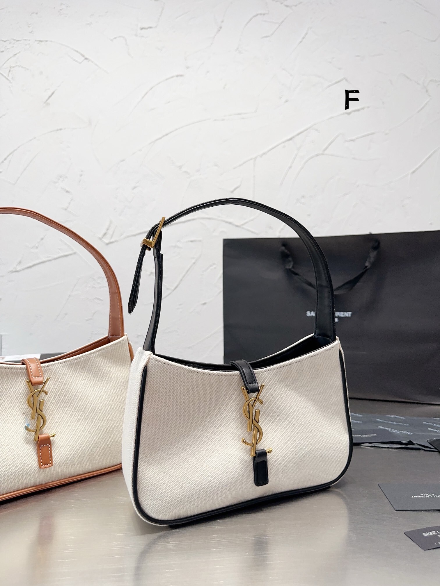 TL7854  YSL  55$ gallery